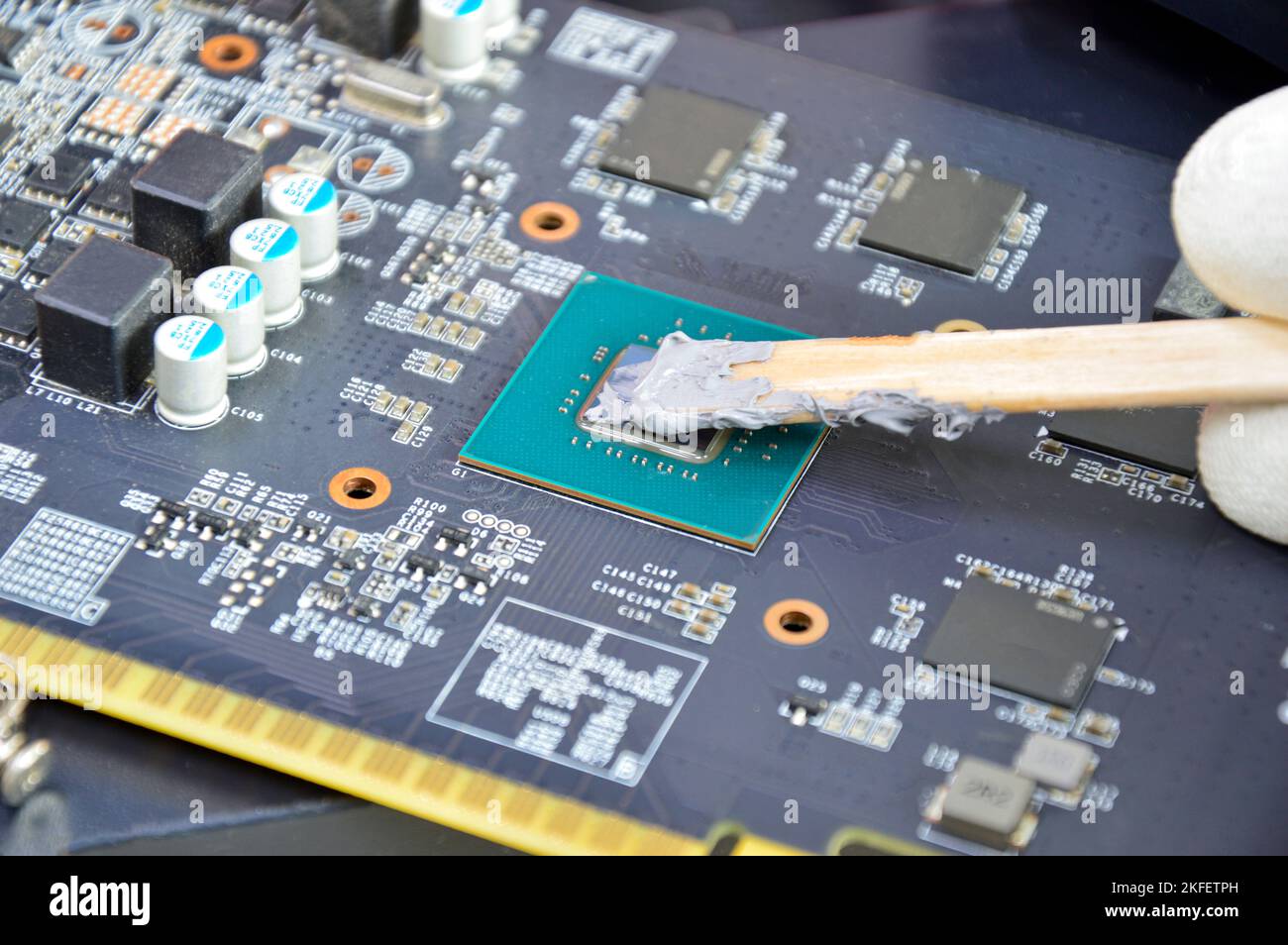 Image of technician filling silicone heat sink chip CPU Stock Photo Alamy