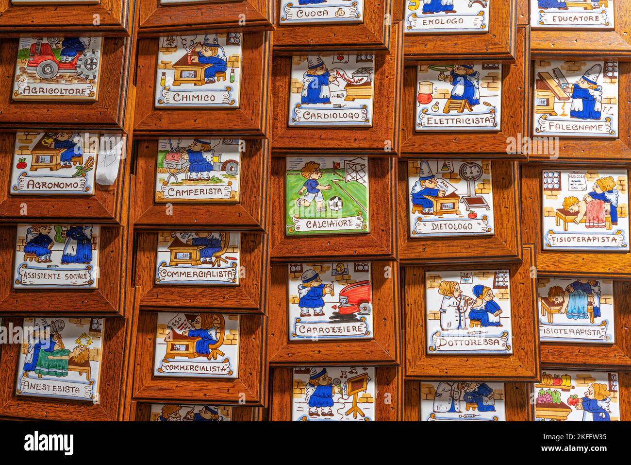 Ceramic tiles framed with the designed crafts sold as souvenirs. Perugia, Umbria, Italy, Europe Stock Photo