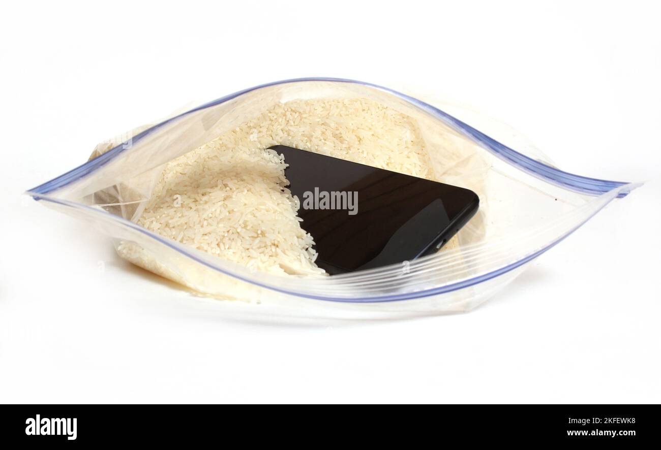 Smartphone in Bag of Rice to remove water from phone Stock Photo Alamy