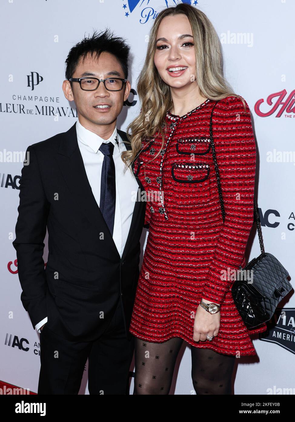 BEVERLY HILLS, LOS ANGELES, CALIFORNIA, USA - NOVEMBER 17: Australian director James Wan and partner/Romanian actress Ingrid Bisu arrive at the 36th Annual American Cinematheque Awards Honoring Ryan Reynolds held at The Beverly Hilton Hotel on November 17, 2022 in Beverly Hills, Los Angeles, California, United States. (Photo by Xavier Collin/Image Press Agency) Stock Photo