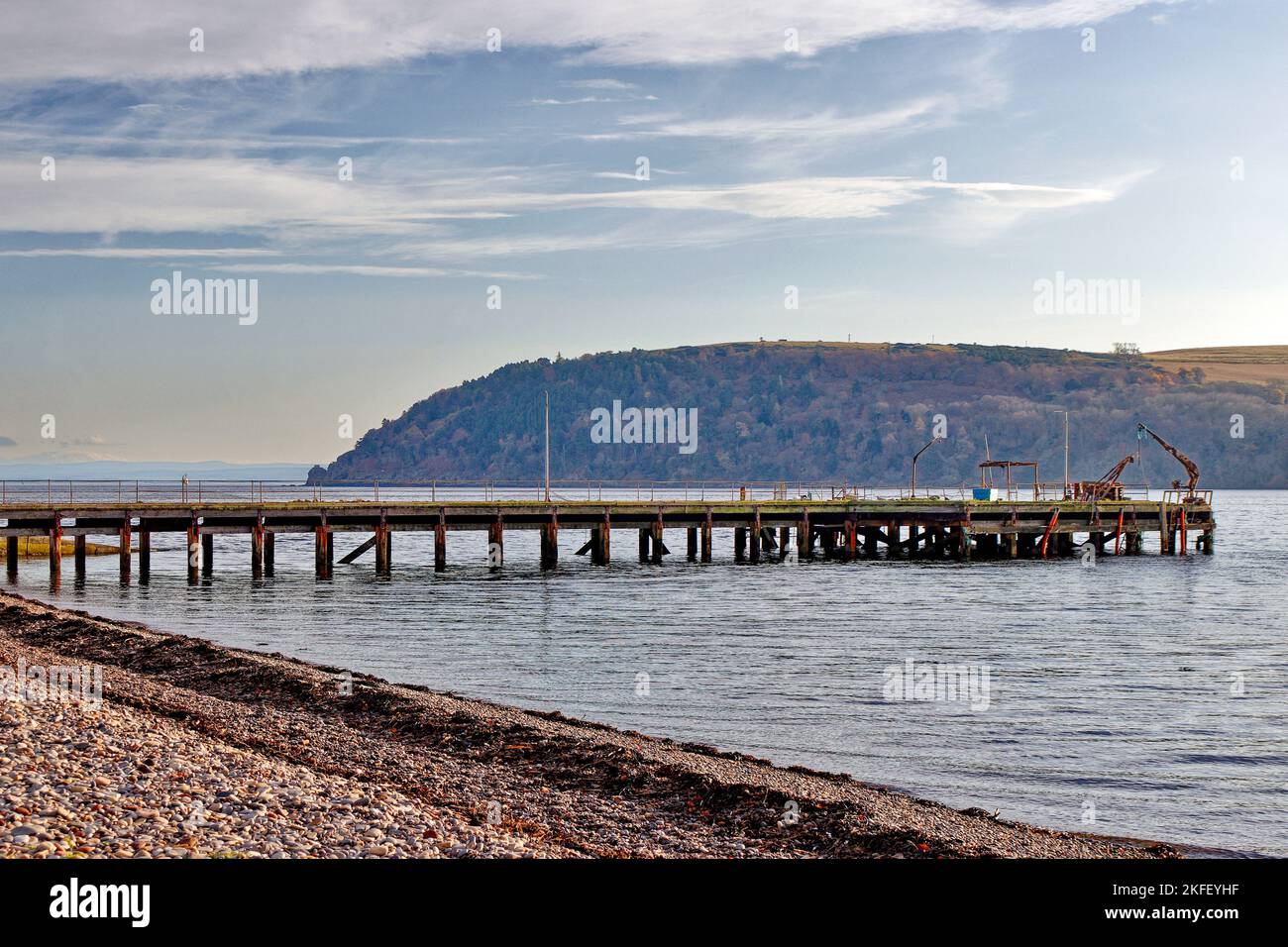 Cromarty Firth Nigg Scotland the old derelict abandoned wooden pier Stock Photo