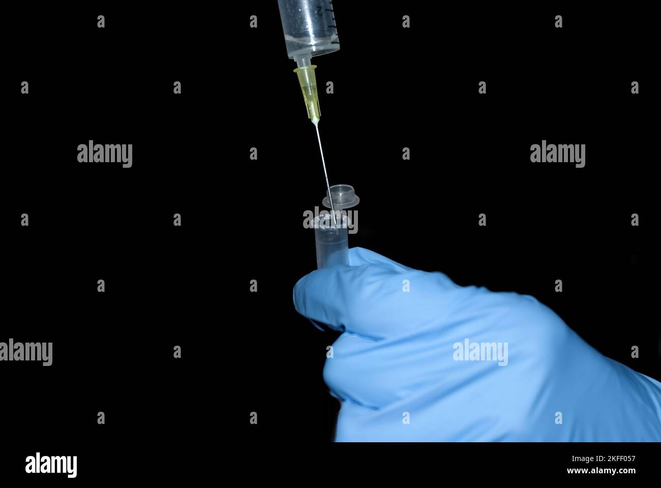 Syringe Sample Collection Collection of some samples, medical trace with a syringe in a vial ...