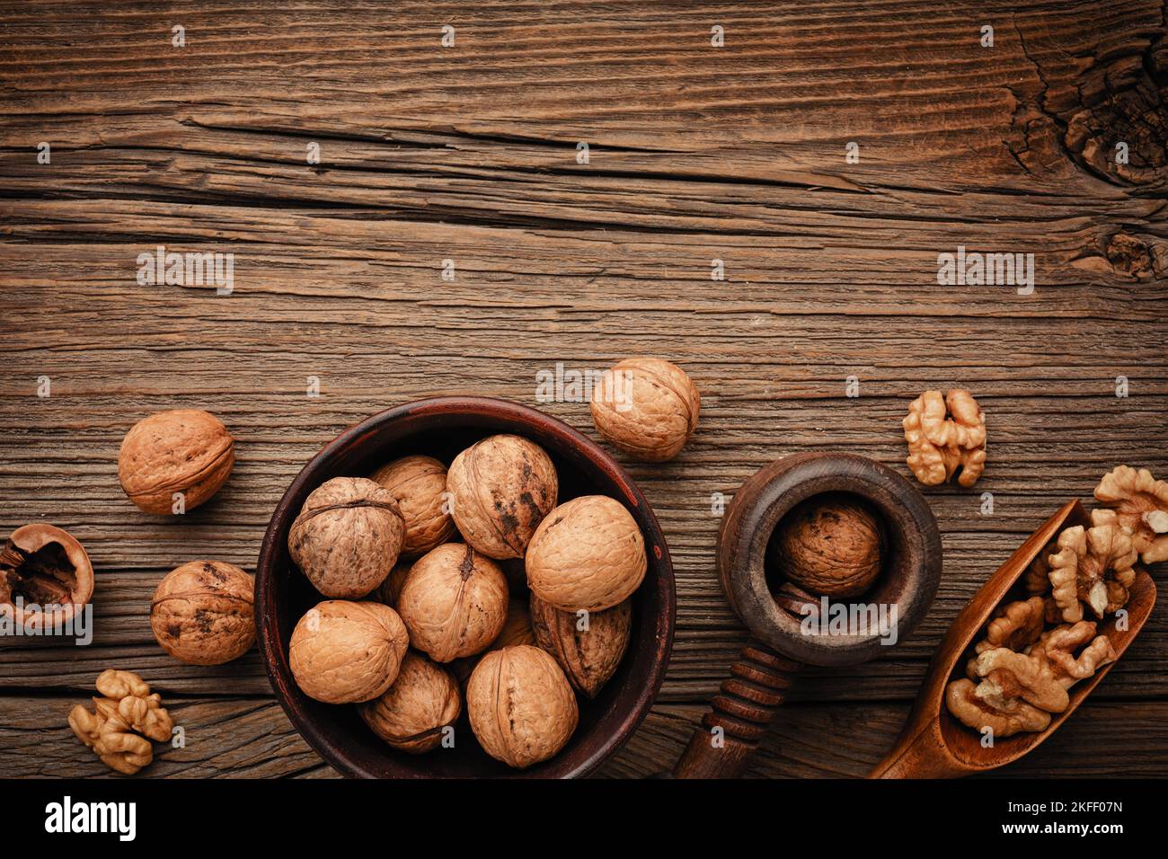 Various nuts on a wooden table. Top view with copy space Stock Photo