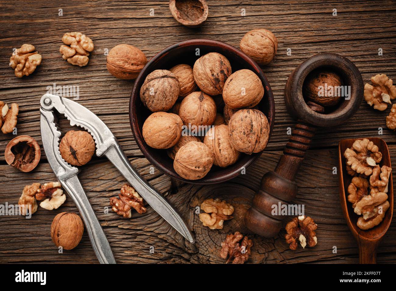 Various nuts on a wooden table. Top view with copy space Stock Photo