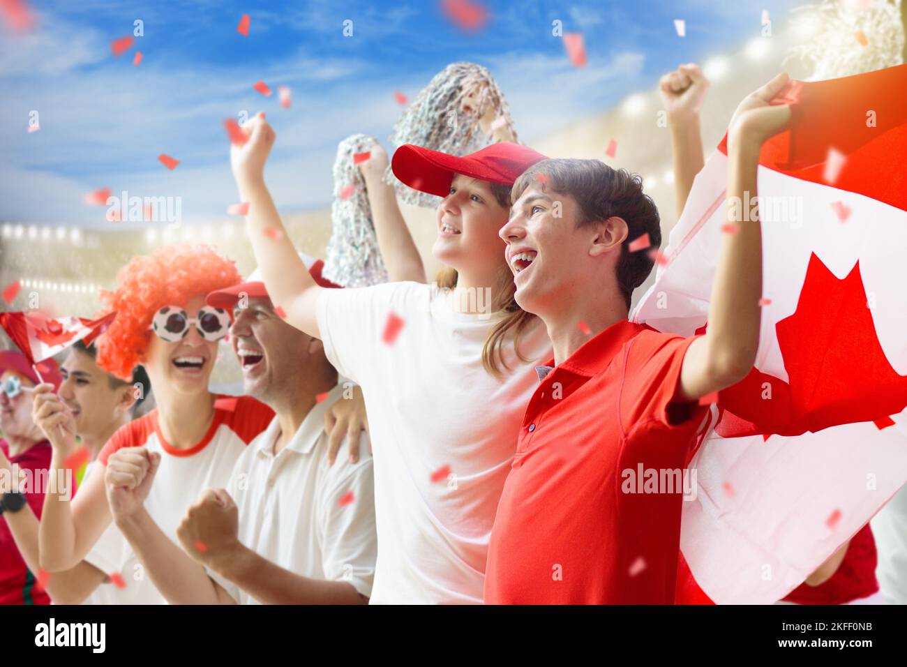 Canada football supporter on stadium. Canadian fans on soccer pitch