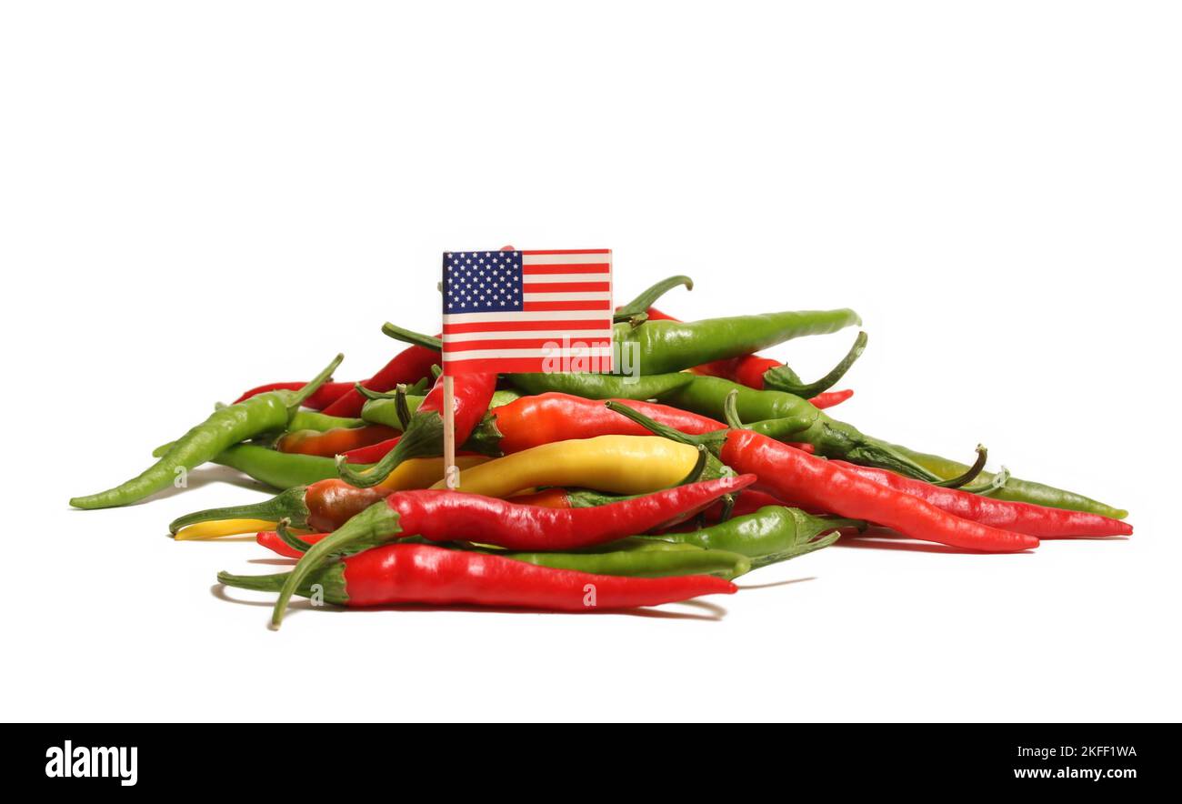 Mixed Color Fresh Cayenne Peppers With Flag of Unites States Isolated on White Stock Photo