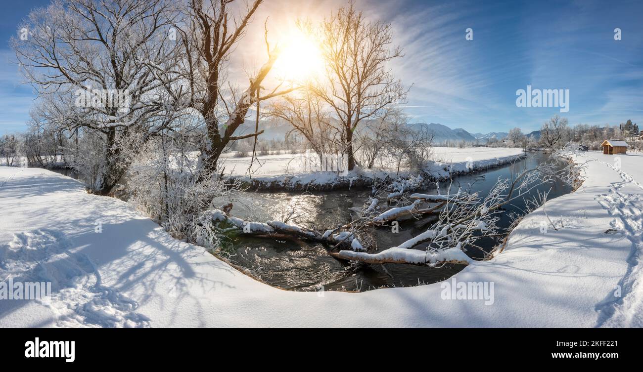 landscape in winter with mountain range and river Stock Photo