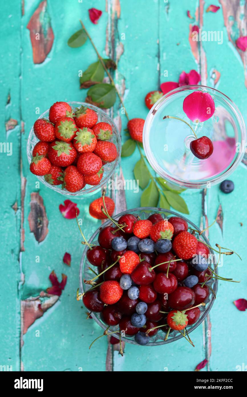 Simple composition still life photo with fresh berries. Seasonal fruit