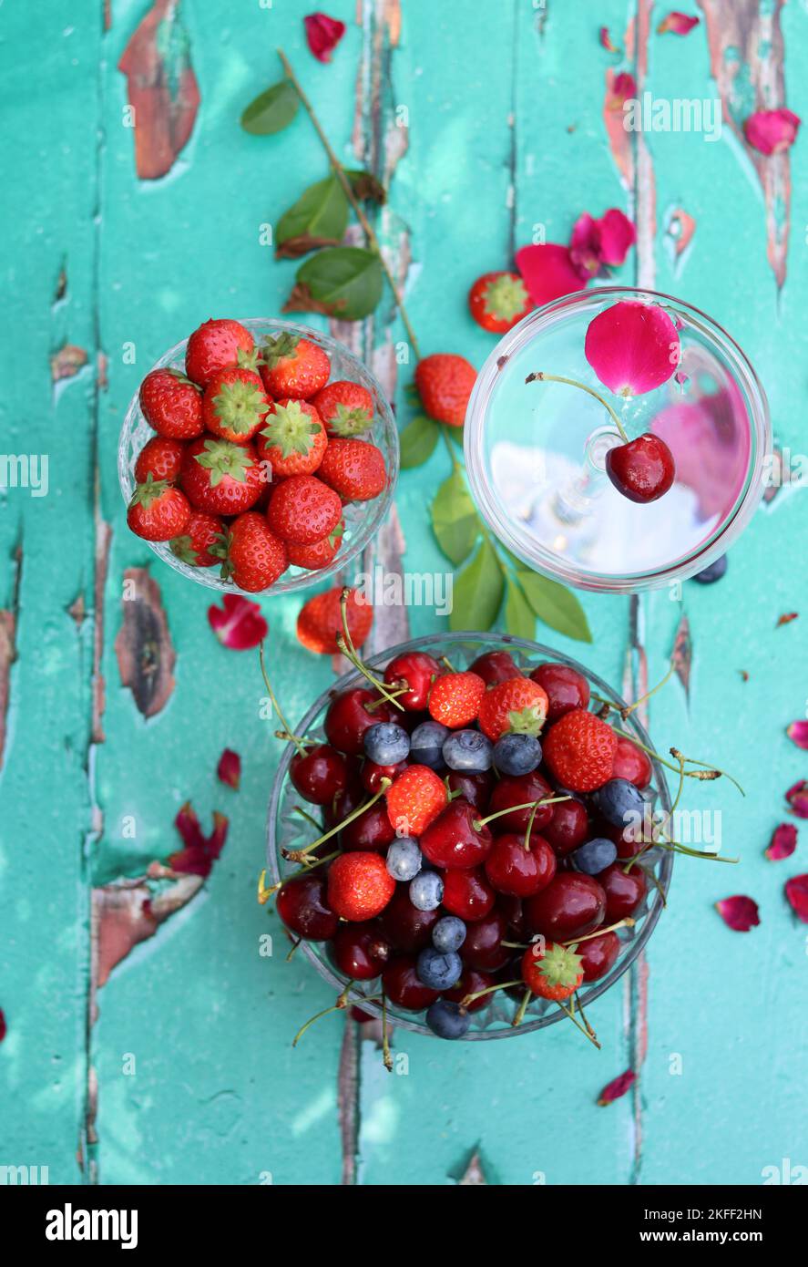 Simple composition still life photo with fresh berries. Seasonal fruit close up photo. Eating healthy concept. Stock Photo