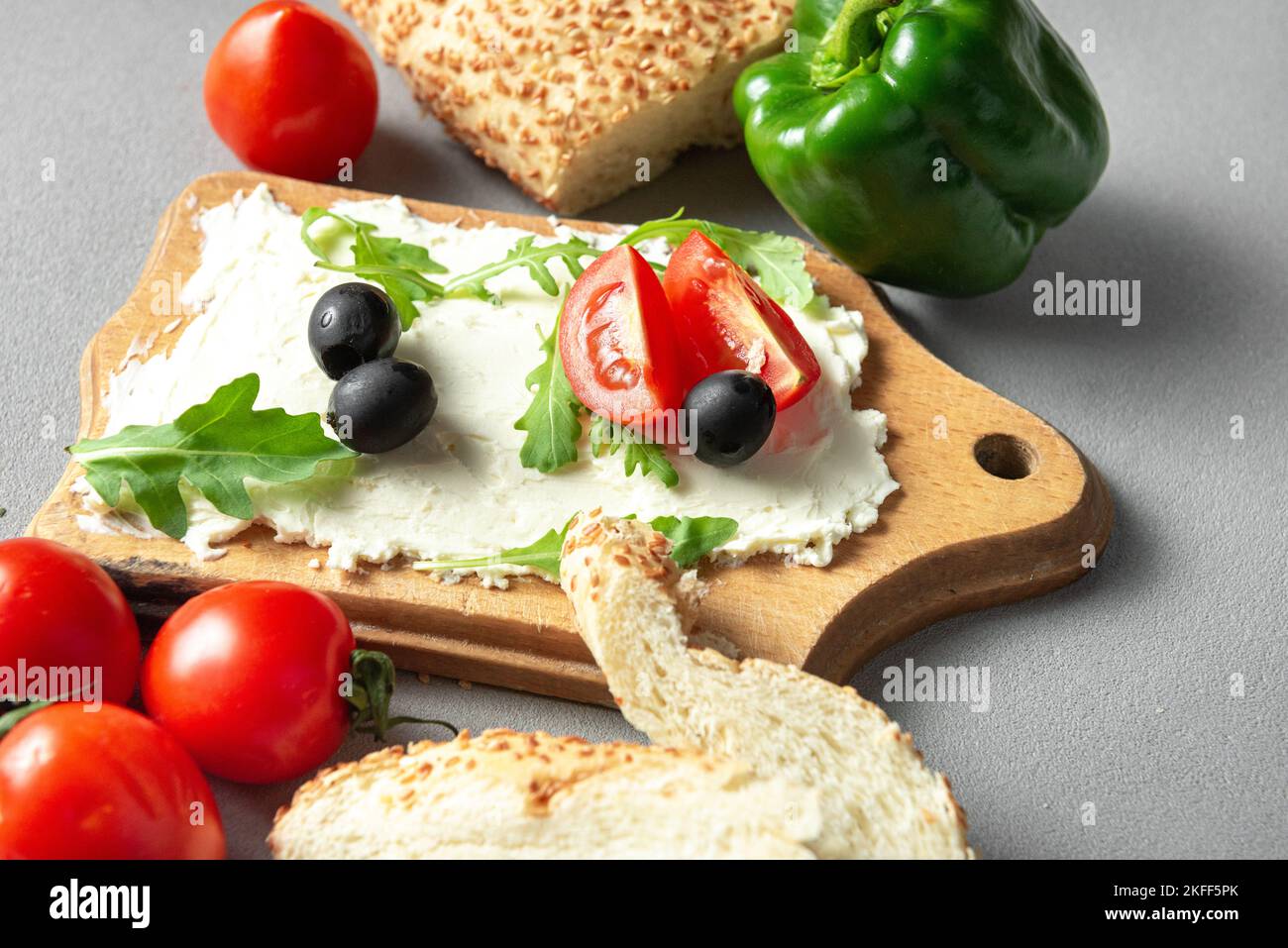 A food trend, bread with butter and toppings. Board with butter snack