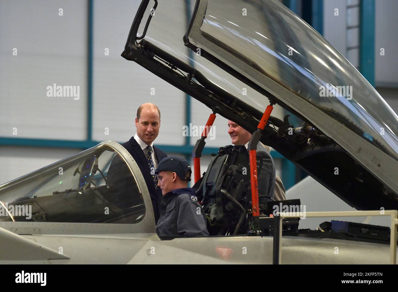 The Prince of Wales meets staff as he tours a Typhoon maintenance hanger during a visit to RAF Coningsby, Lincolnshire, to learn about future technological innovations and open a new boxing club. Picture date: Friday November 18, 2022. Stock Photo