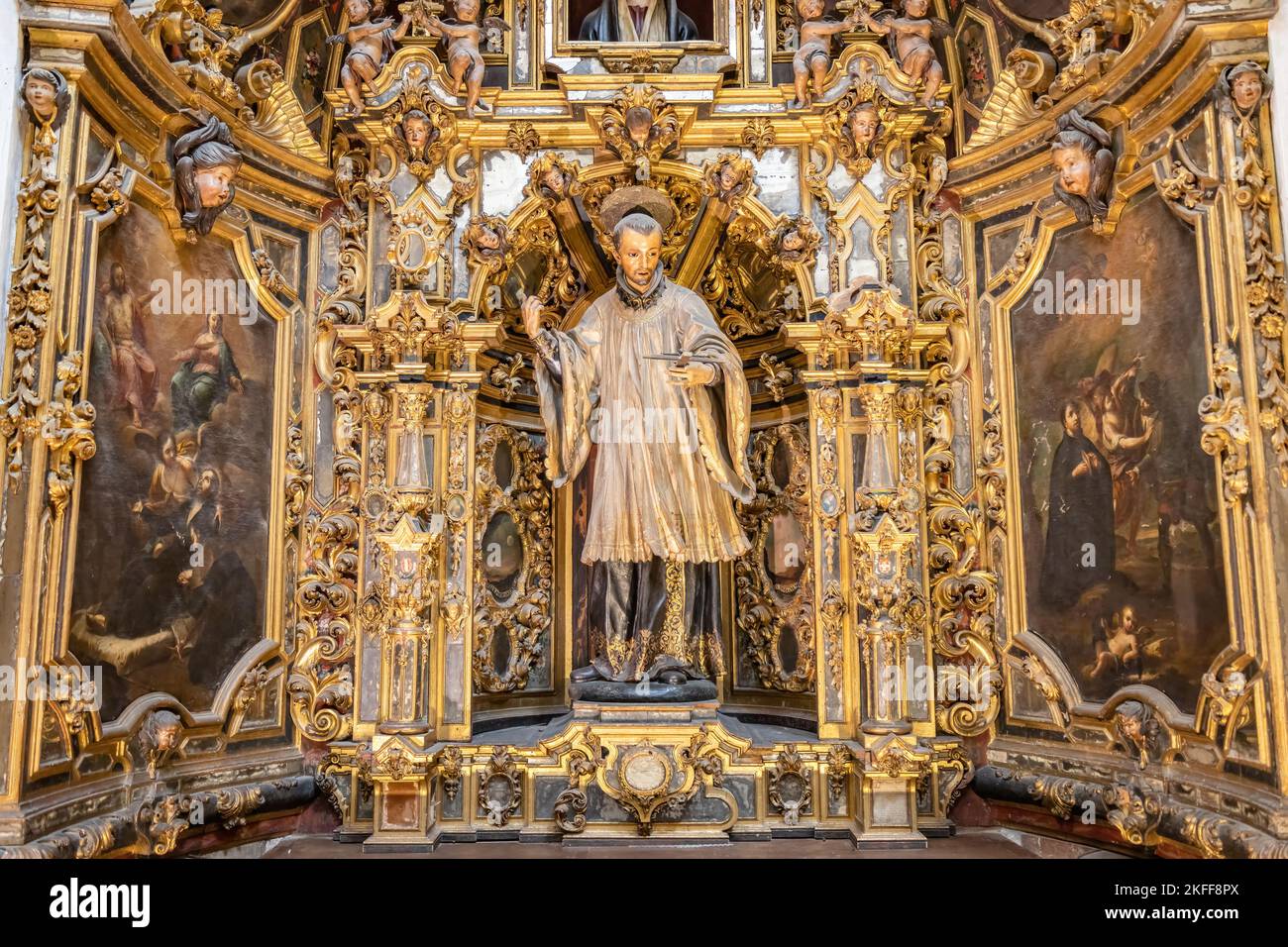 Seville, Spain - November 12, 2022: Altarpiece of Saint John Francis Regis inside the Church of San Luis de los Franceses of baroque architecture from Stock Photo