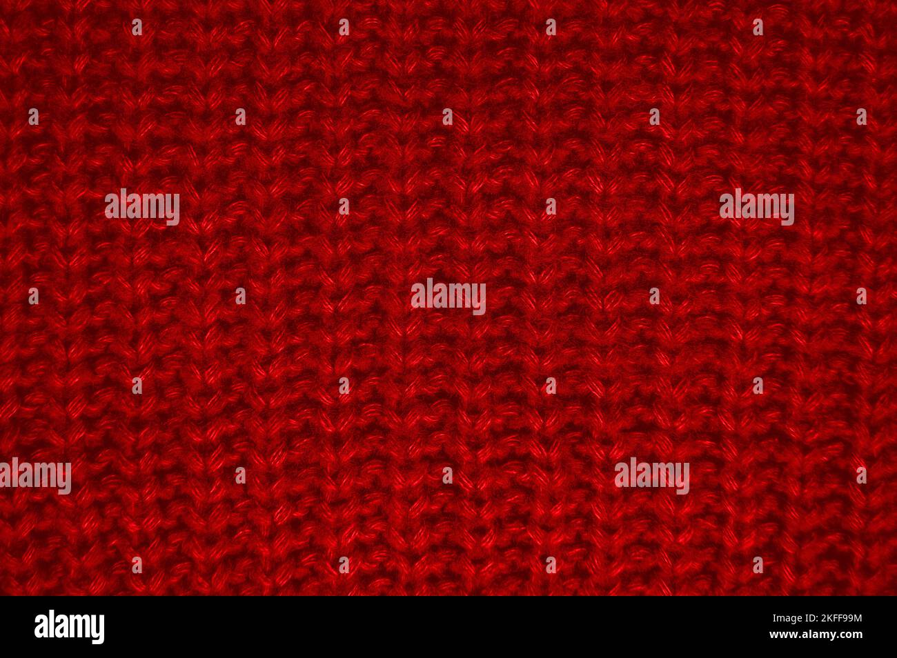Organic knitting background with macro woven threads. Stock Photo
