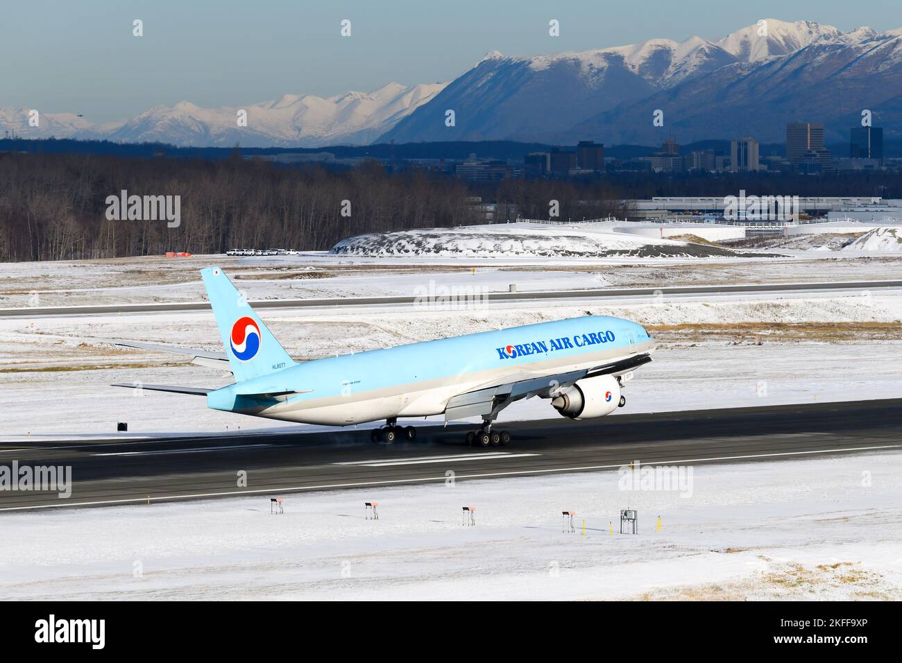 Korean Air Cargo Boeing 777 aircraft landing. Airplane 777 for cargo transport. Freighter aircraft of KoreanAir Cargo on arrival at airport. Stock Photo