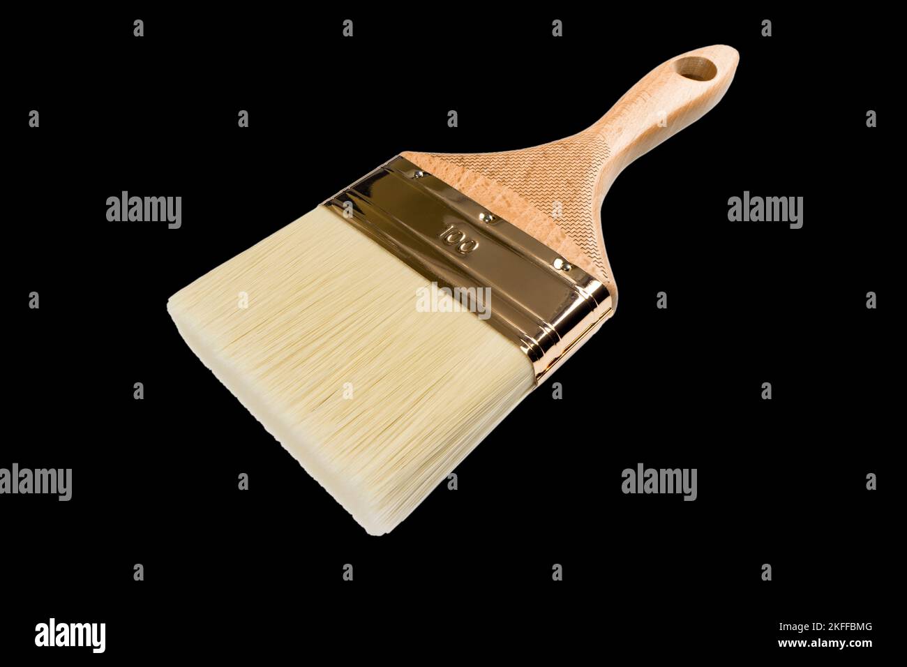 Clean new paint brush isolated on black background. Red handle paint brush isolated on black background Stock Photo