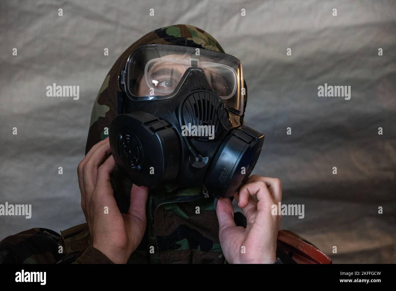 A U.S. Air Force 509th Bomb Wing Security Forces member checks equipment during a Chemical, Biological, Radiological, Nuclear exercise at Whiteman Air Force Base, Missouri, Sept. 14, 2022. Airmen participate in a CBRN and other training exercises to deter and win against adversaries. Stock Photo