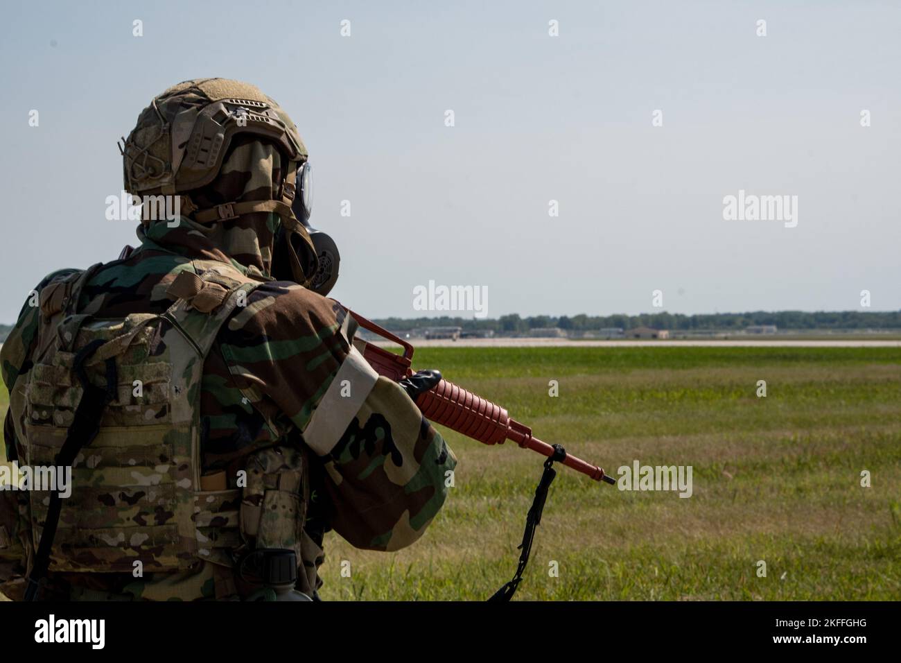 A U.S. Air Force 509th Bomb Wing Security Forces member, secures the exercise area during a Chemical, Biological, Radiological, Nuclear exercise at Whiteman Air Force Base, Missouri, Sept. 14, 2022. Airmen participate in a CBRN exercise to deter and win against adversaries. Stock Photo