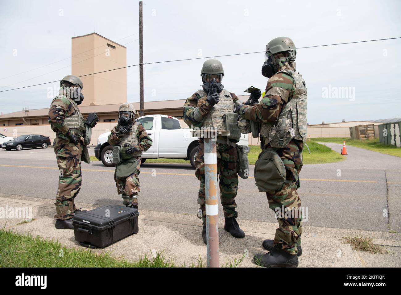 U.S. Air Force 8th Civil Engineer Squadron emergency management (left) and 8th Healthcare Operations Squadron bioenvironmental engineering flight teams, test for contaminants during a training event at Kunsan Air Base, Republic of Korea, Sept. 14, 2022. Following the simulated chemical agent attack, the teams were sent out to further identify the type of chemical agent present and followed up with a containment plan to ensure the simulated attack did not impact the installation’s mission. Stock Photo