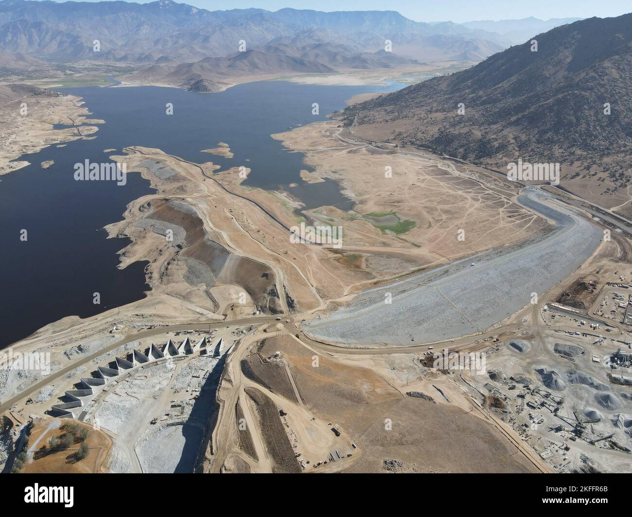 An aerial view of the labyrinth weir, emergency spillway, and auxiliary