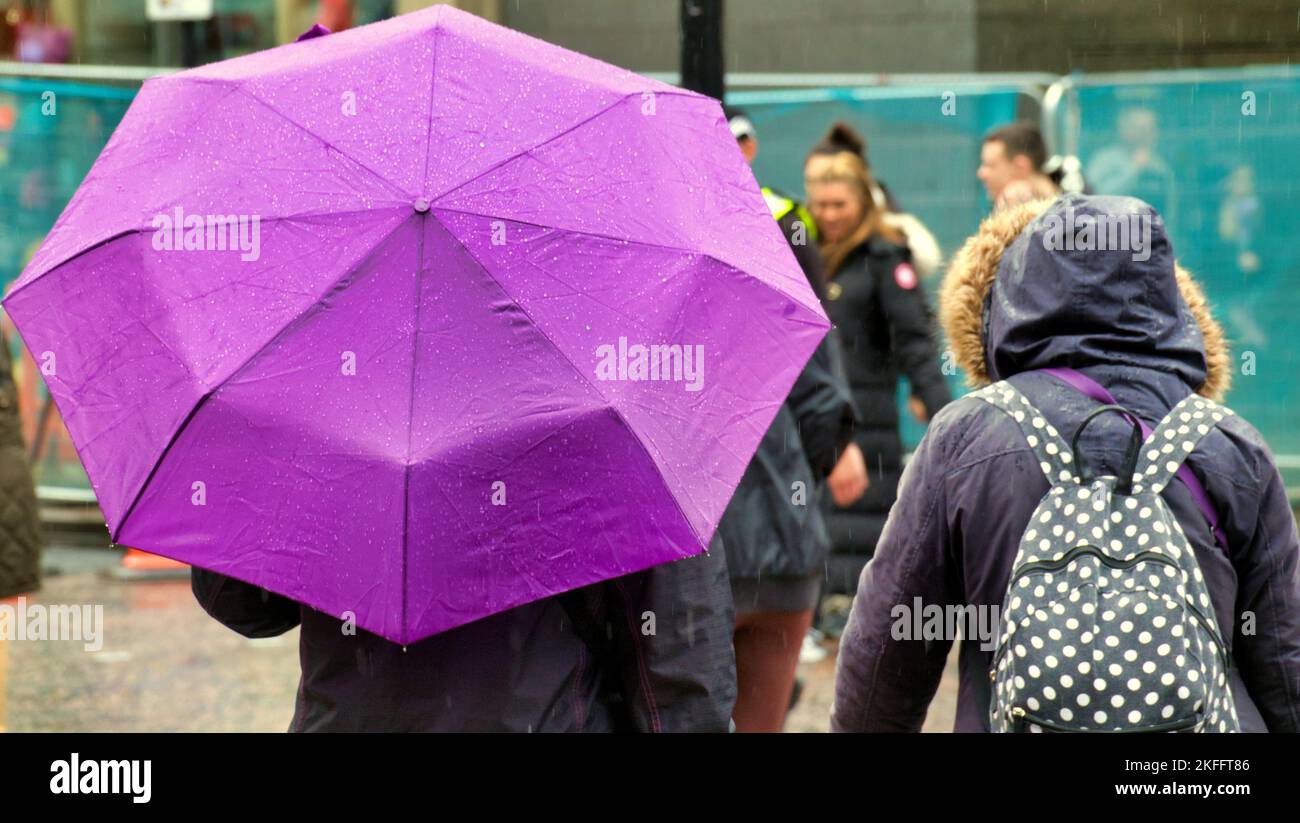 Glasgow, Scotland, UK 18th November, 2022. UK Weather:  Torrential Rain saw a spate of umbrellas in the centre of the city.  Credit Gerard Ferry/Alamy Live News Stock Photo