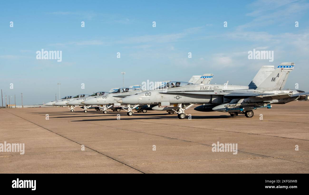 Marines attached to Marine Fighter Attack Squadron (VMFA) 112, Marine Aircraft Group 41, 4th Marine Aircraft Wing, await takeoff in F/A-18C Hornets at Naval Air Station Joint Reserve Base Fort Worth, Texas, Sept. 15, 2022. VMFA-112 is participating in a joint long-range strike exercise with Marine Aerial Refueler Transport Squadron (VMGR) 234, VMFA-225, Marine Fighter Training Squadron (VMFT) 401 and U.S. Air Force 513th Operations Support Squadron. This large force exercise demonstrates MAG-41's ability to project long-range strike capability and integrate with the Marine Corps' active compon Stock Photo