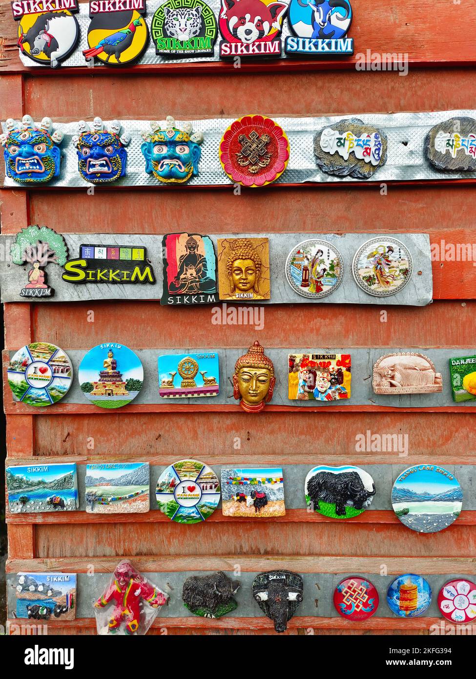 artisanal crafts and fridge magnets for sale at street Indian market in Sikkim, India Stock Photo