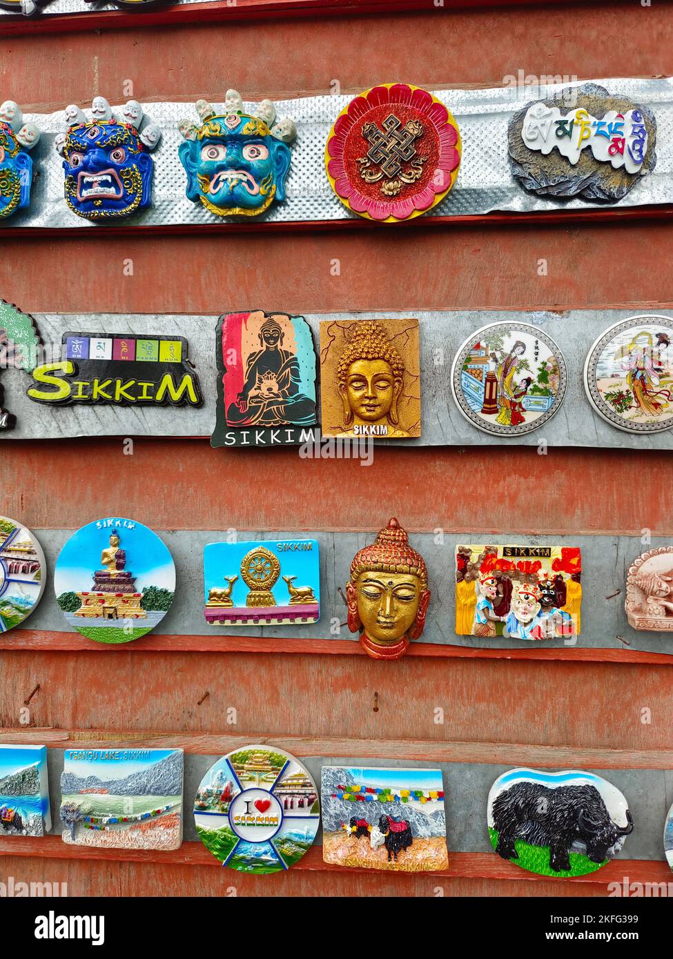 artisanal crafts and fridge magnets for sale at street Indian market in Sikkim, India Stock Photo