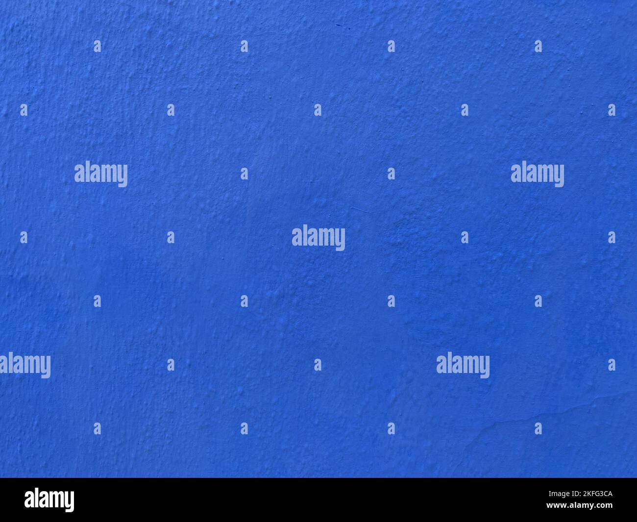 Bright blue textured wall background Stock Photo