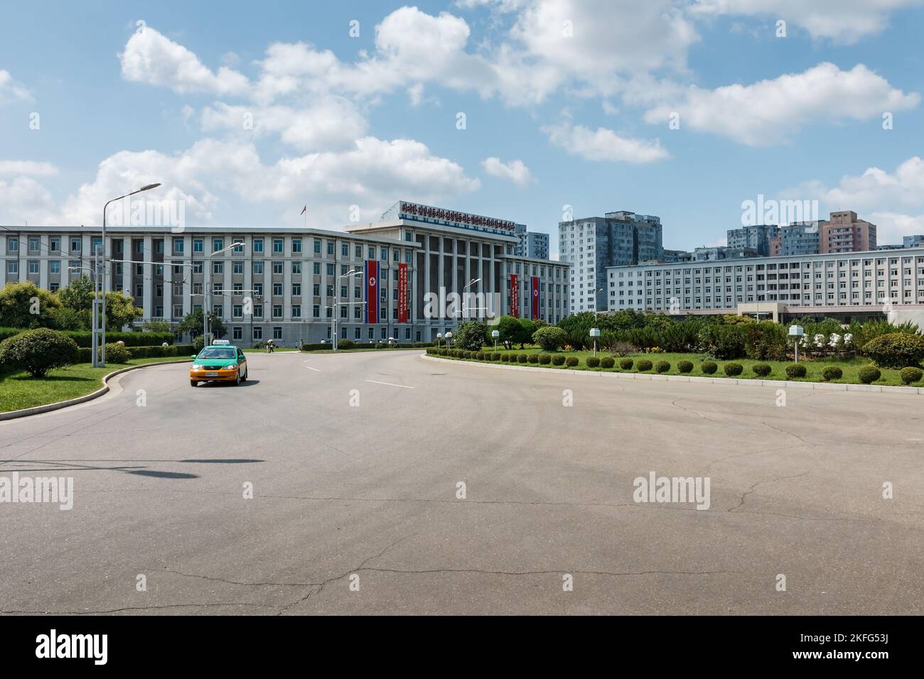 Pyongyang, North Korea - July 27, 2014: State Planning Commission near the Arch of Triumph in Pyongyang. Moranbong Street Stock Photo