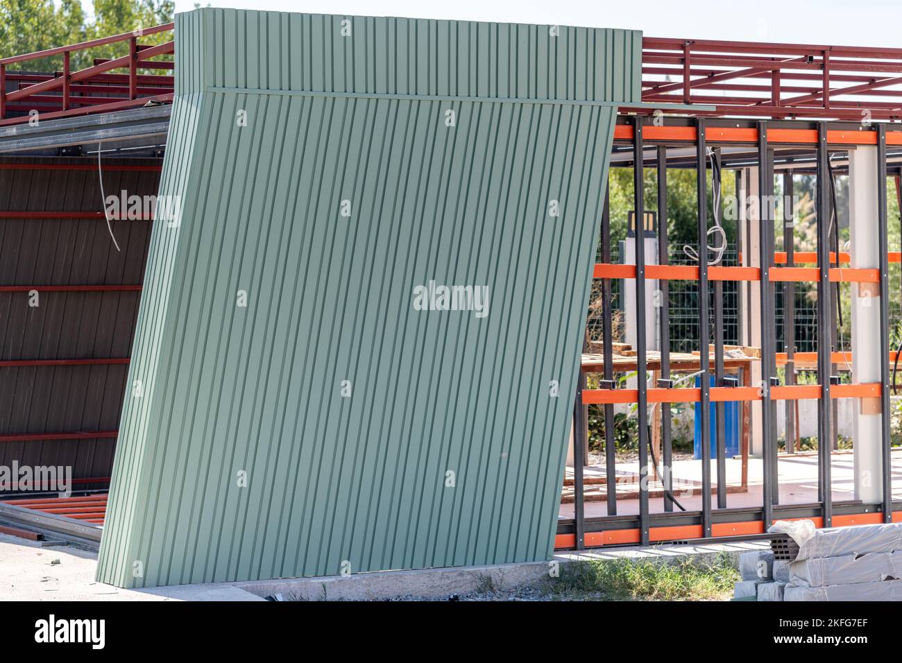 Newly built metal framed building with siding. Construction of a new tiny house. selective focus Stock Photo