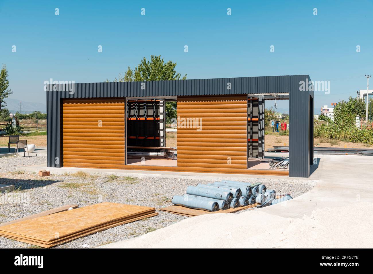 Newly built metal framed building with siding. Construction of a new tiny house. selective focus Stock Photo