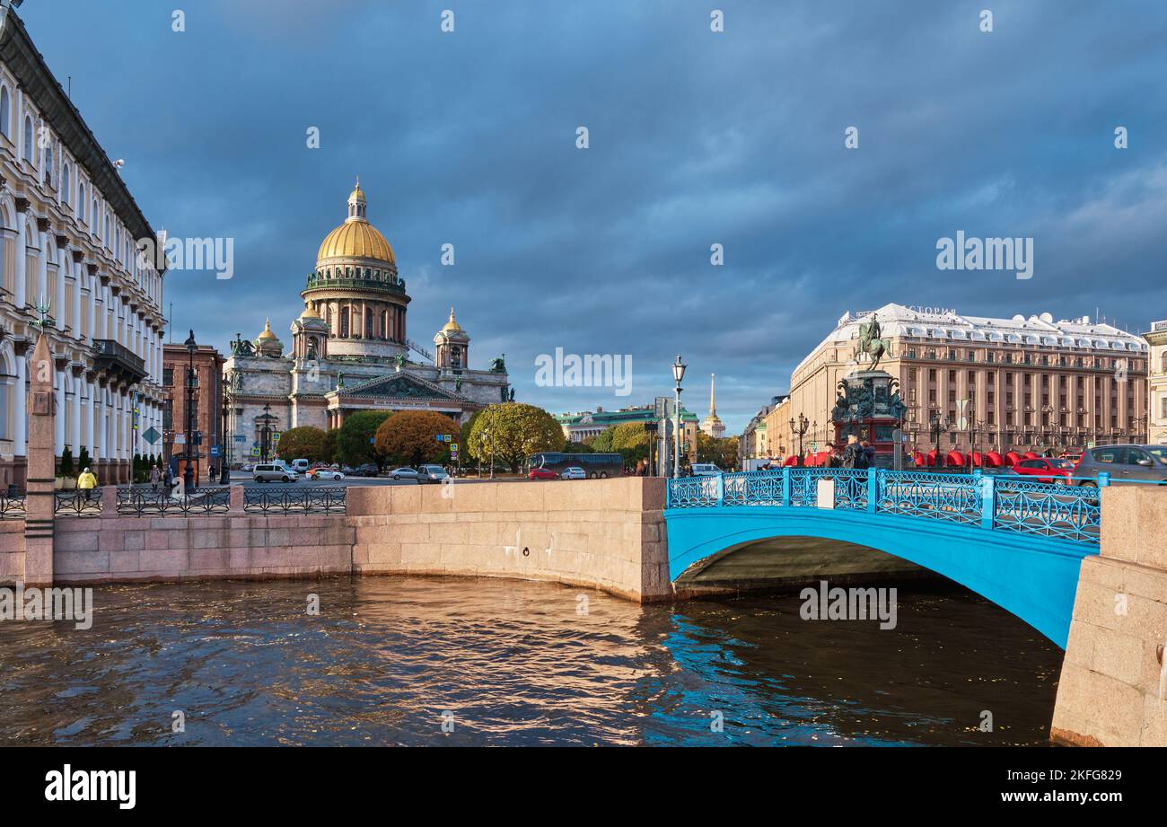 Blue Bridge over the Fontanka River, 1842-1844, overlooking St. Isaacs Cathedral and the Astoria Hotel, landmark: St. Petersburg, Russia - October 07, Stock Photo