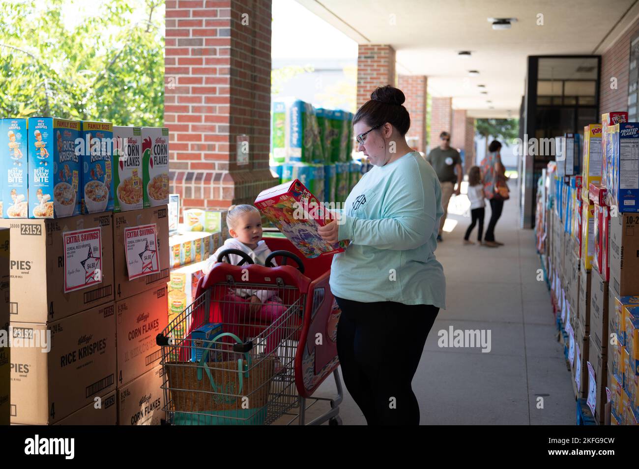 Tiffany Hardeman shops during a case lot sale at the Commissary with