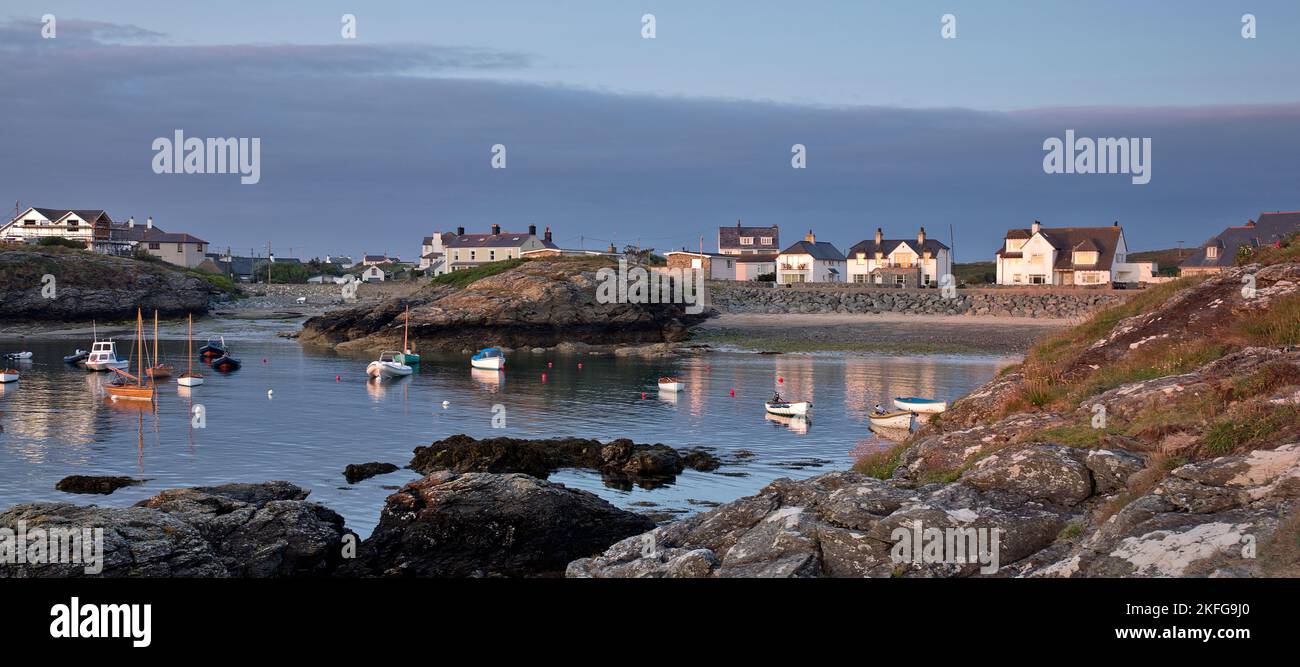 Porth Diana with houses of Trearddur Bay in late evening light on the western coast of Holy Island part of the Isle of Anglesey (Sir Ynys Mon) North W Stock Photo