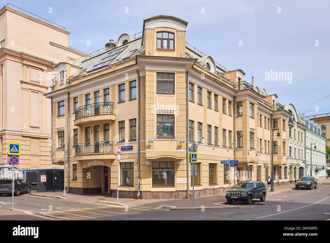 Corner of Brodnikov Lane and Malaya Yakimanka Street, a view of a modern residential building built in the old style in 2002: Moscow, Russia - August Stock Photo