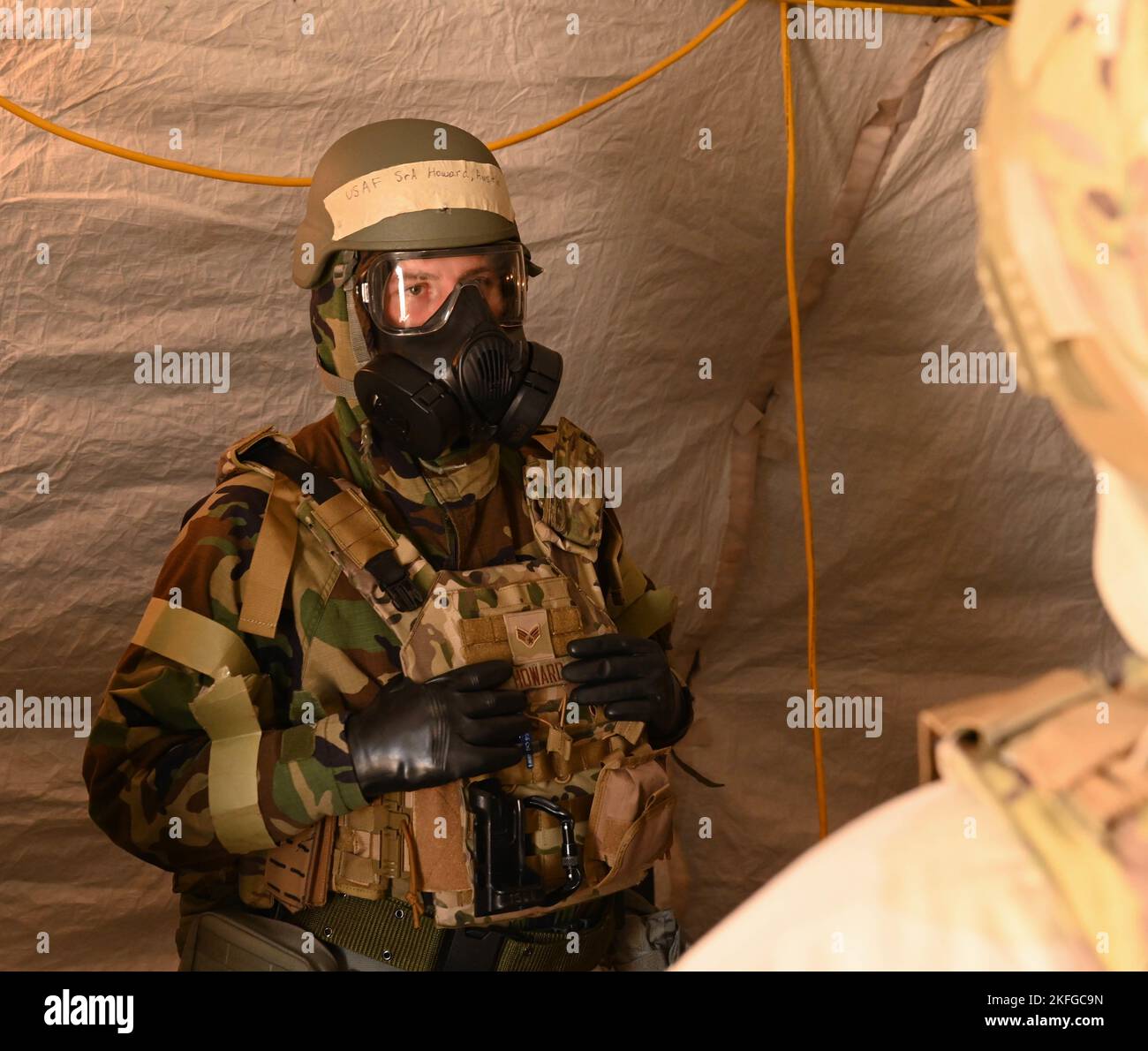 U.S. Air Force Airmen shelter in place during the CBRN exercise at Whiteman Air Force Base, Missouri, September 15, 2022. Training such as this ensures Airmen are resilient, equipped and combat-ready. Stock Photo