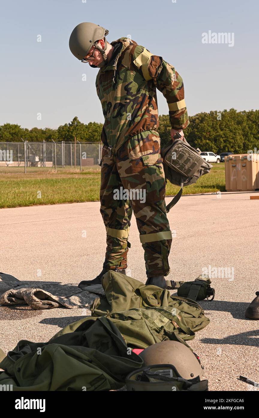 U.S. Air Force Airmen don MOPP gear during a CBRN exercise at Whiteman Air Force Base, Missouri, September, 15, 2022. MOPP gear is protective equipment worn in CBRN-contaminated environments meant to protect an individual from CBRN agents. This CBRN training utilizing MOPP gear ensures Airmen are ready to respond and defend its personnel and assets. Stock Photo