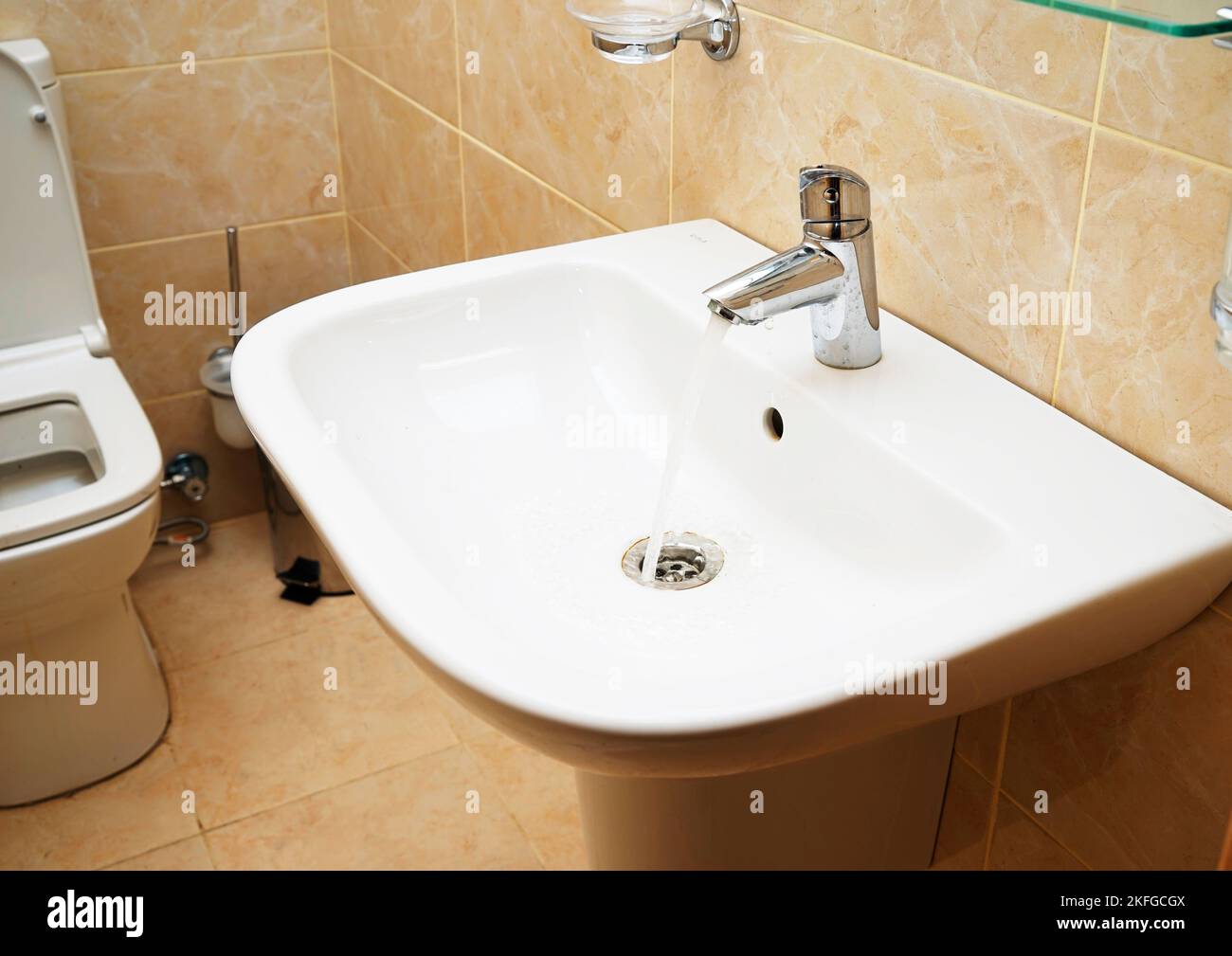 White sink and towell in SPA salon. bathroom. Stock Photo