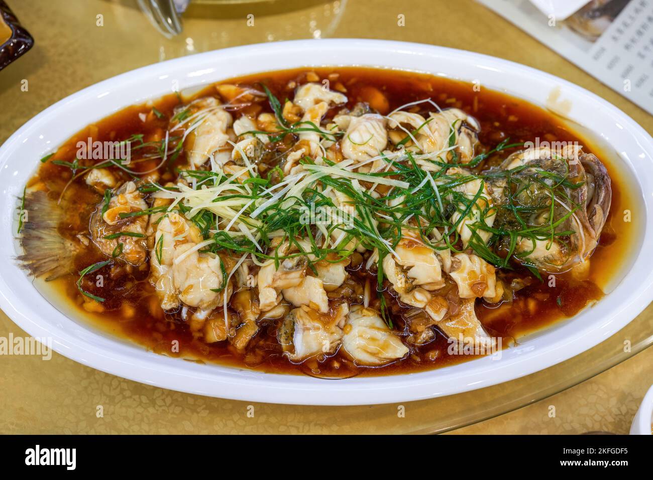 A delicious Chinese dish, steamed sea bass fillets Stock Photo Alamy