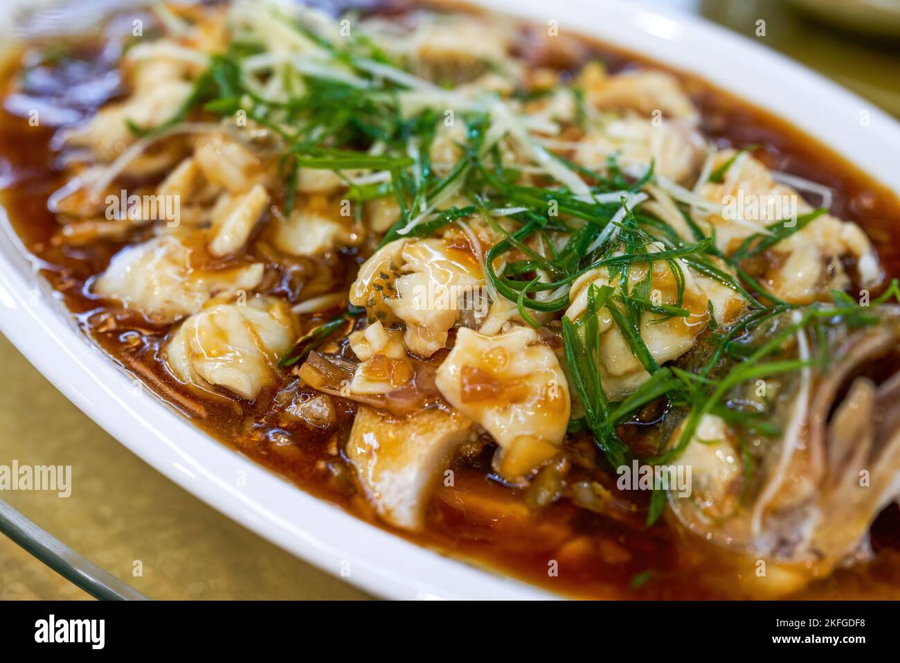 A delicious Chinese dish, steamed sea bass fillets Stock Photo Alamy
