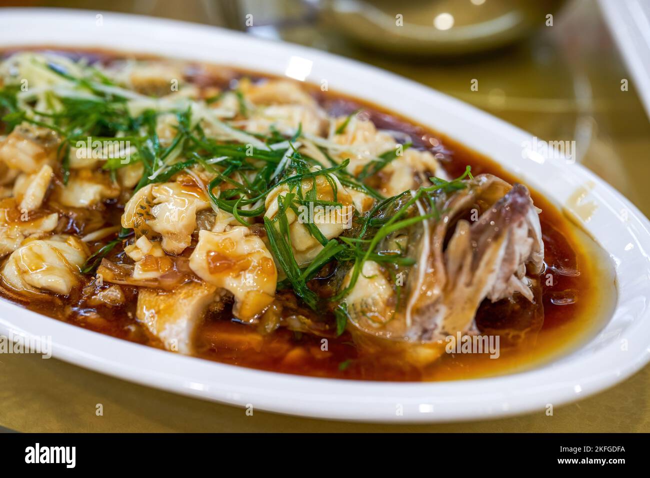 A delicious Chinese dish, steamed sea bass fillets Stock Photo Alamy