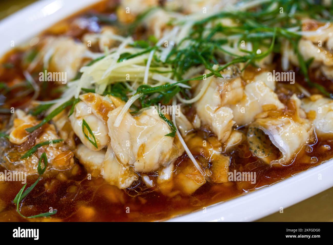 A delicious Chinese dish, steamed sea bass fillets Stock Photo Alamy