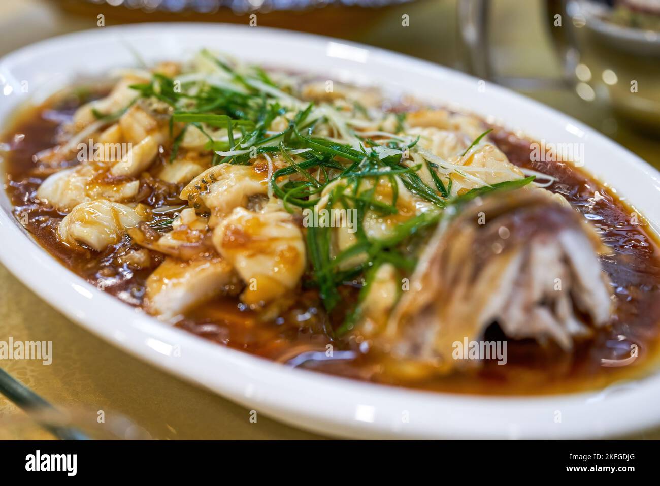A delicious Chinese dish, steamed sea bass fillets Stock Photo Alamy