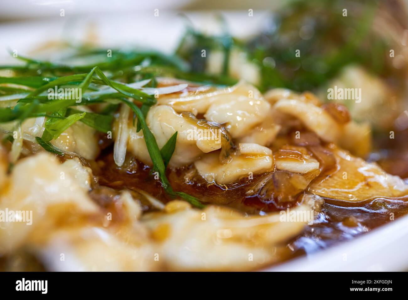 A delicious Chinese dish, steamed sea bass fillets Stock Photo Alamy