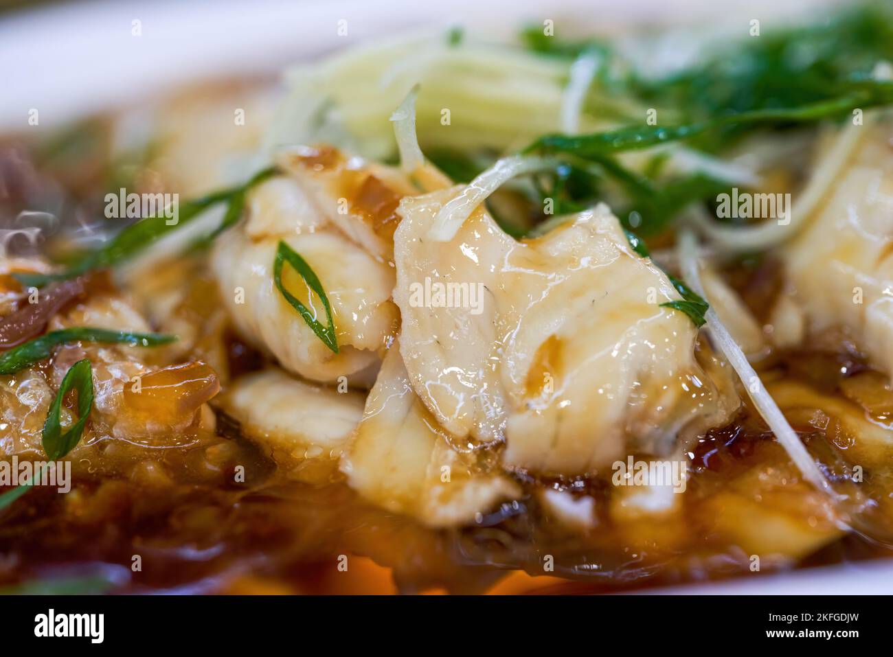 A delicious Chinese dish, steamed sea bass fillets Stock Photo Alamy