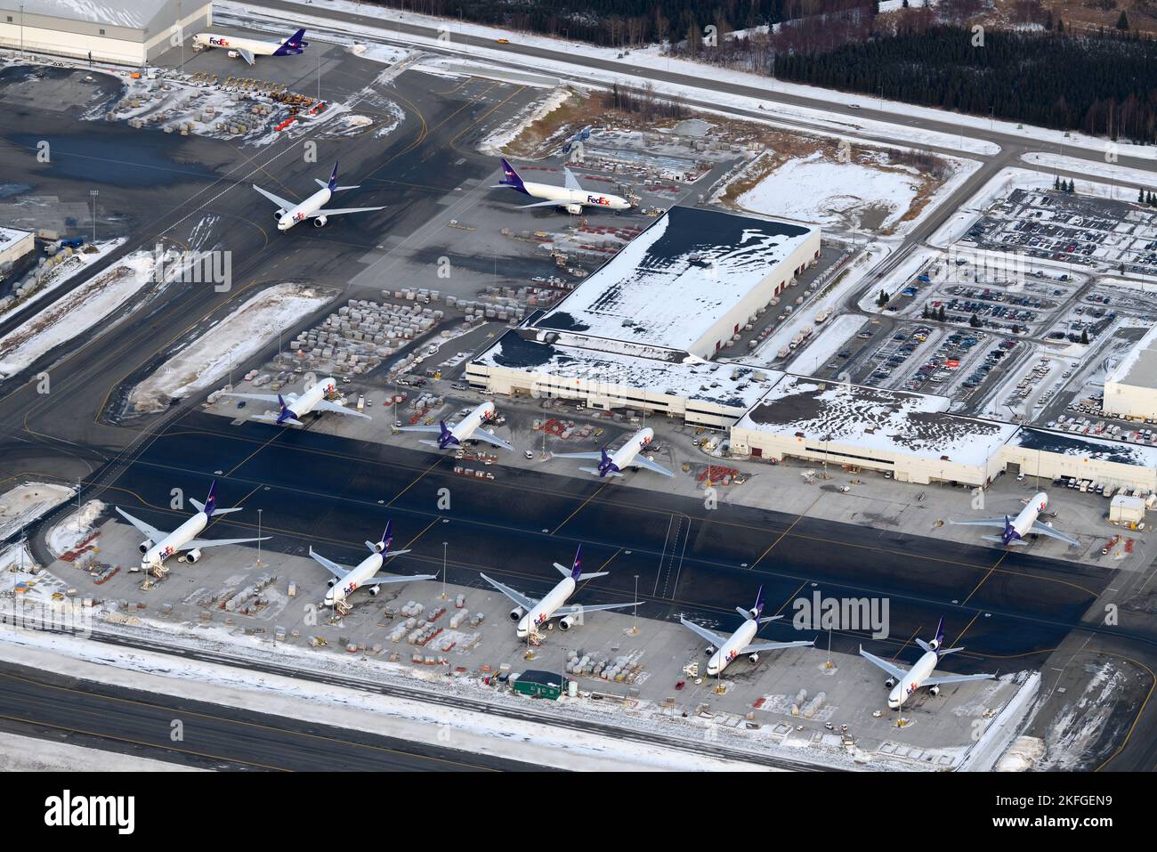 FedEx Cargo airline ramp at Anchorage Airport, a hub for aircraft cargo transportation in Alaska. Federal Express airplanes at it's freight hub. Stock Photo