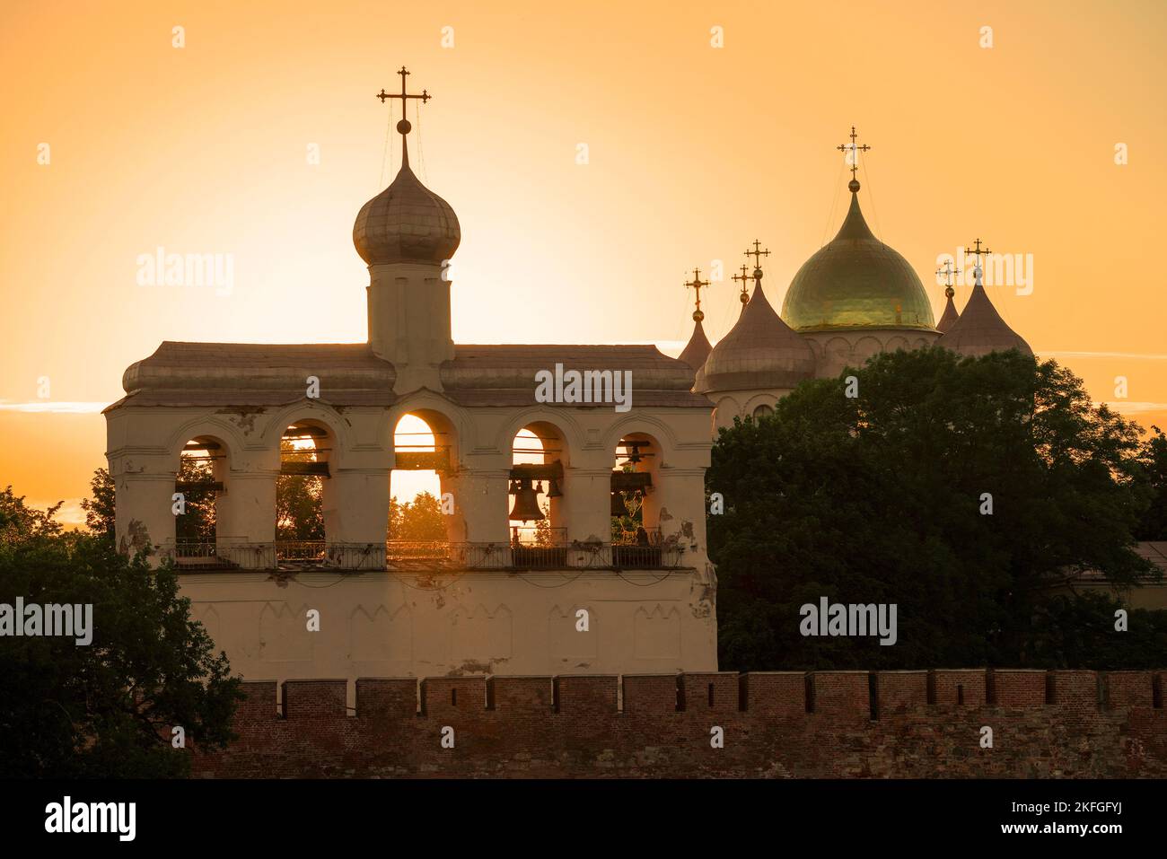 View of the belfry and domes of St. Sophia Cathedral in summer sunset. Veliky Novgorod, Russia Stock Photo