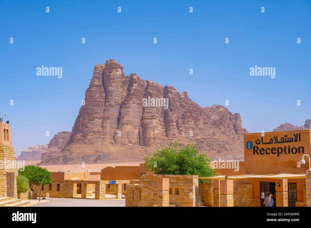 The Wadi Rum visitors centre and the 7 pillars of wisdom mountain in the distance. Stock Photo