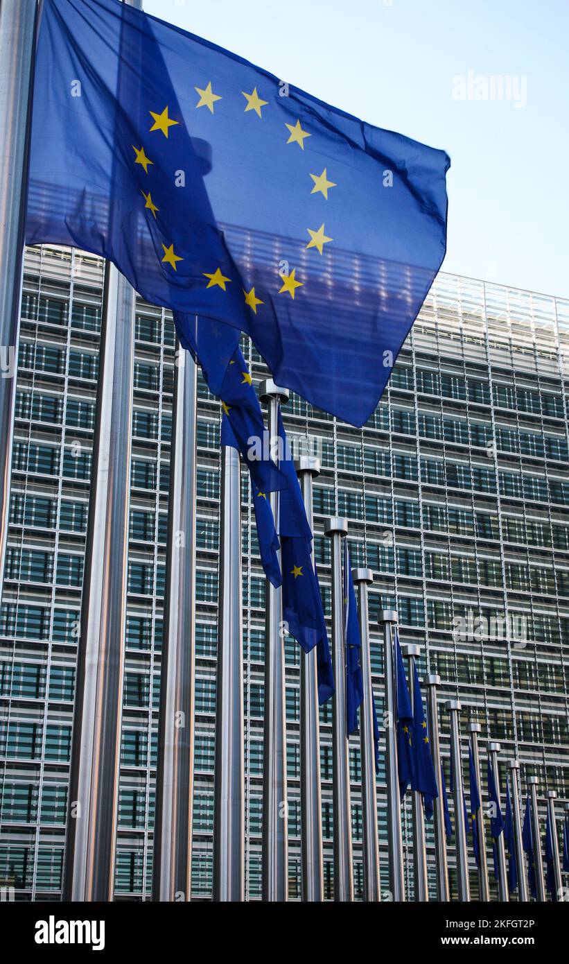 BRUSSELS EU FLAG on flagpoles outside the EU commission building Stock Photo