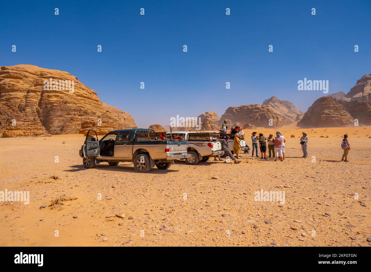 Tourists on a 4X4 safari in Wadi Rum Jordan Stock Photo